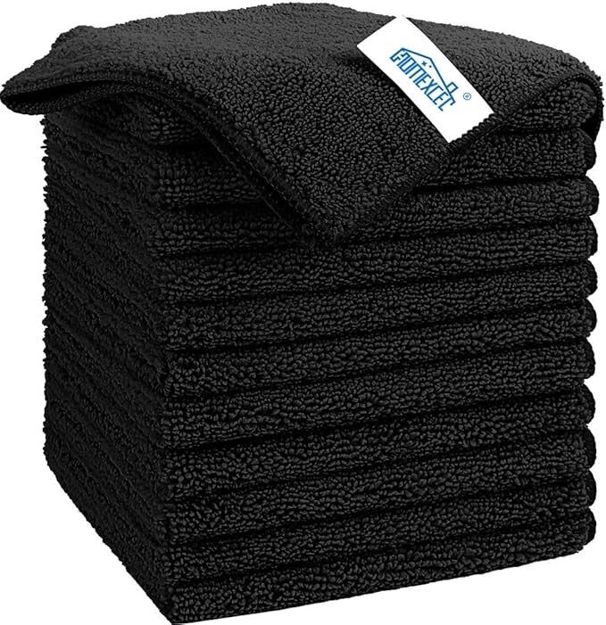 Stack of black microfiber cloths for cleaning holiday decor and surfaces