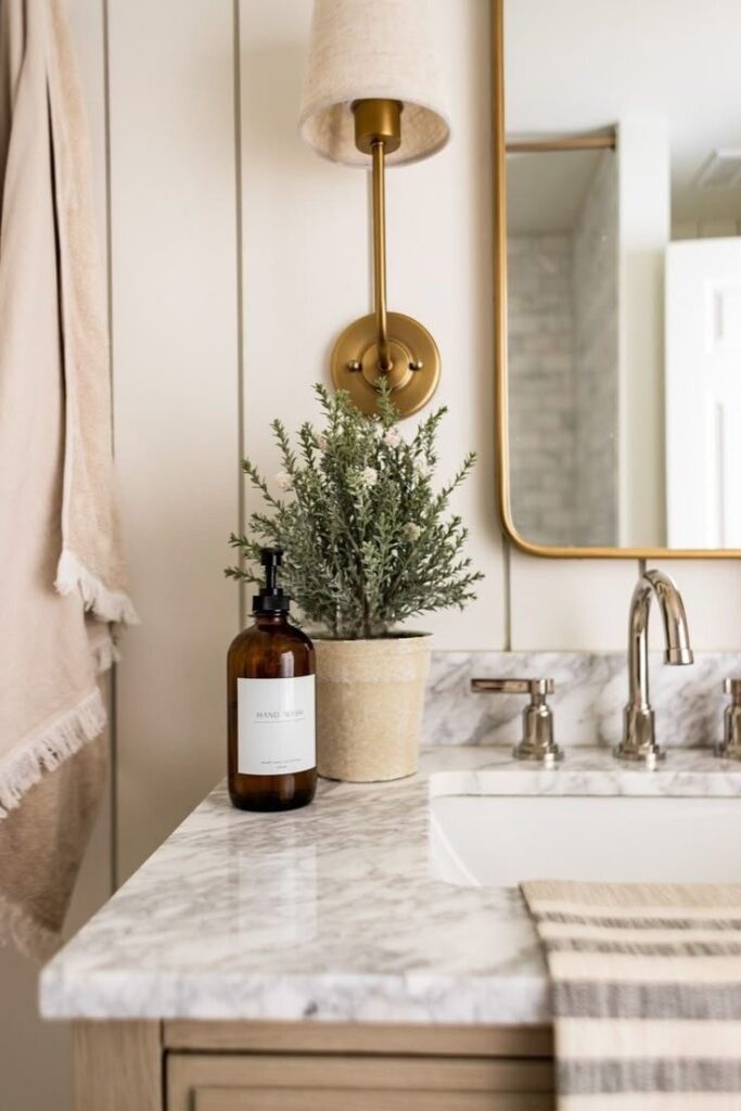 Neutral ceramic soap dispenser styled on a bathroom counter with minimal decor
